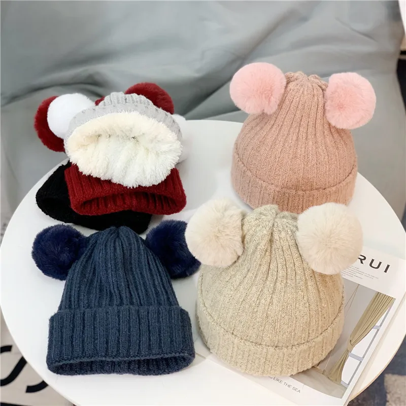 KENSHELLEY Wholesale Girl Women Warm Bonnet Cute Winter Knitted Beanies Hat Double Fur Pom Pom Hats Female