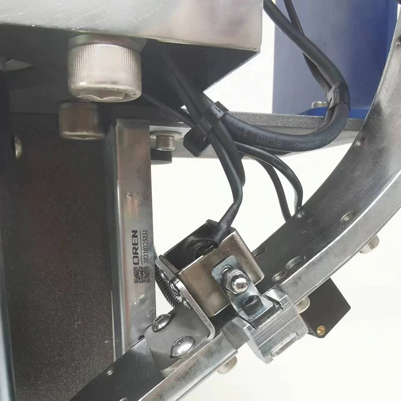 Raincoat button riveting machine Baseball jacket button riveting machine RN-DKJS Leather nailing machine