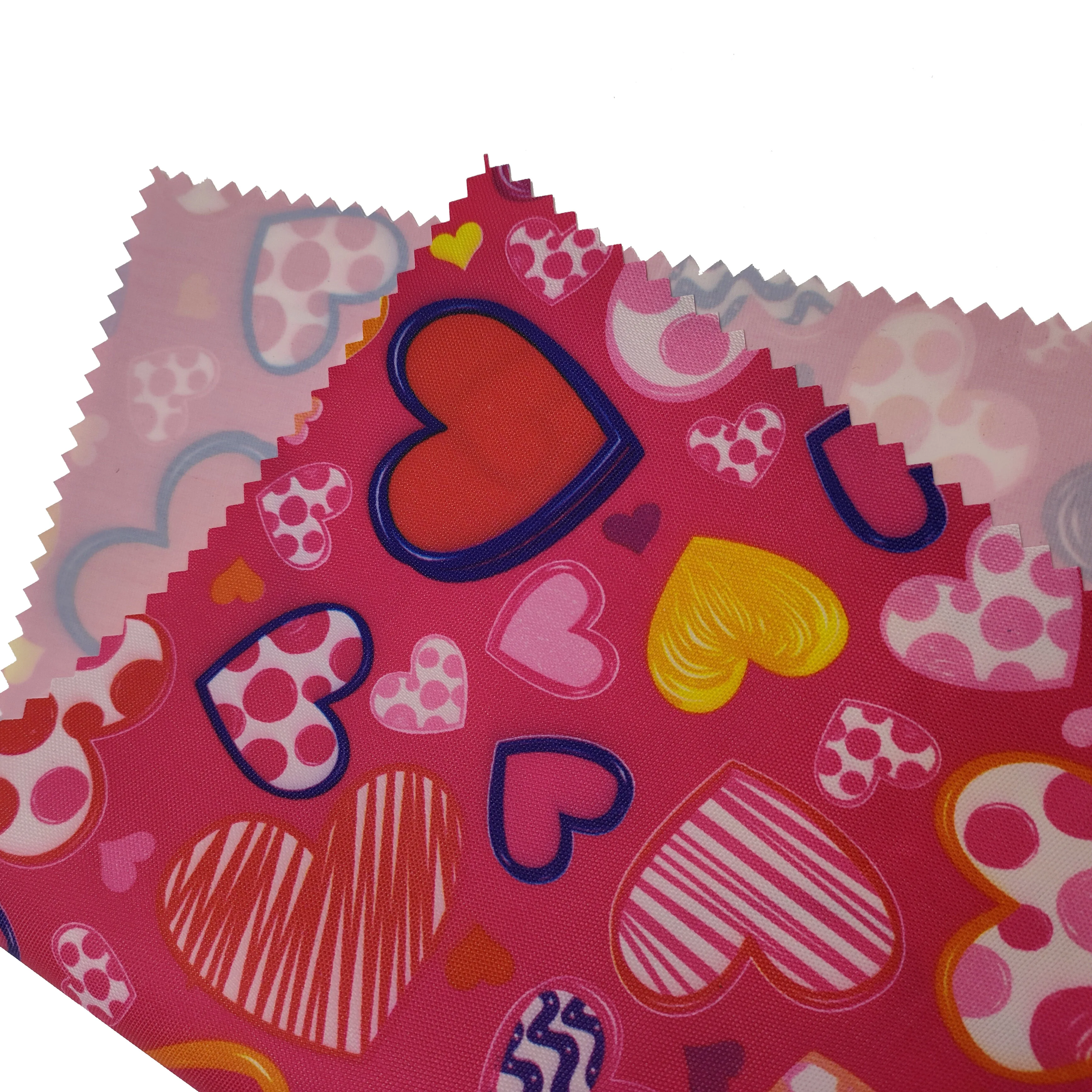 High quality 420D printed polyester Oxford fabric simple flower shaped cartoon printed waterproof coating suitable for girls