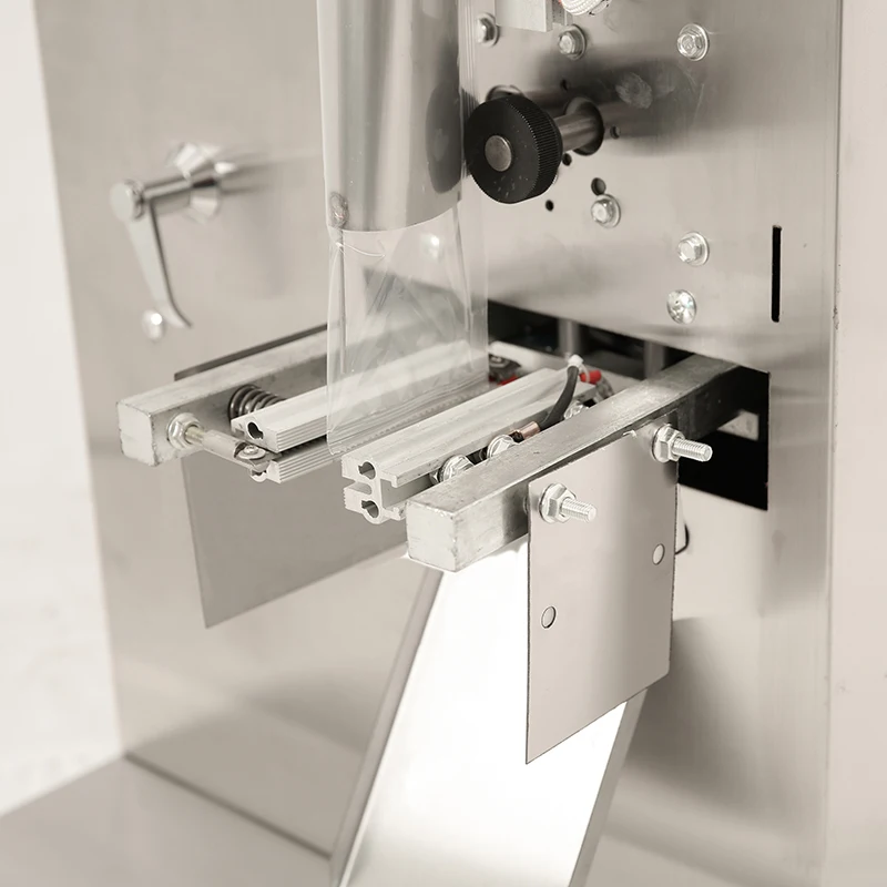 Automatic Small Bag Tea Packaging Machine With Date Printer Nut Packaging Machine Weighing Filling Coffee Packaging Machine