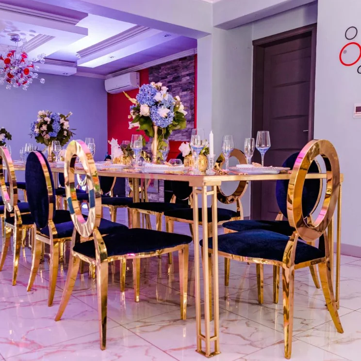 China fancy new design o gold back metal party wedding chair with cushion for hotel banquet ballroom furniture