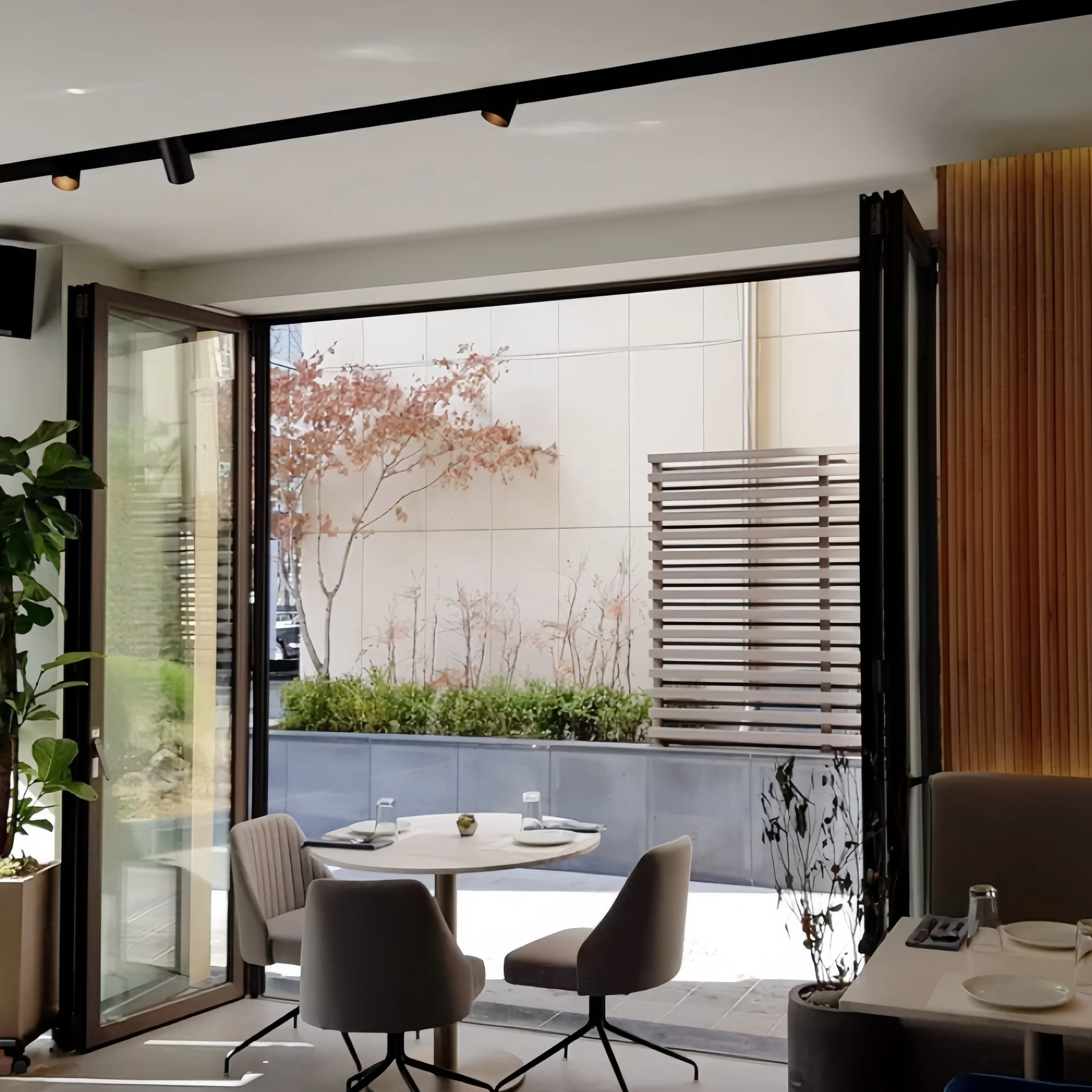 Customized Latest European and American Style Standards wind Sound proof System Movable Glass Door Bi Folding Foldable for sale