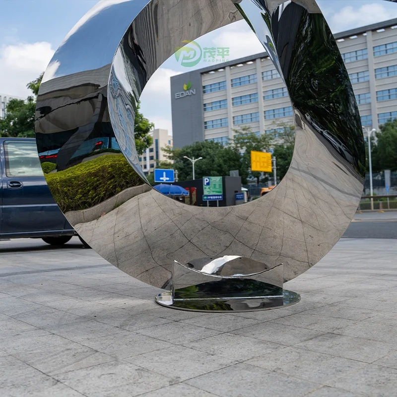 Large stainless steel sculpture in the park business square