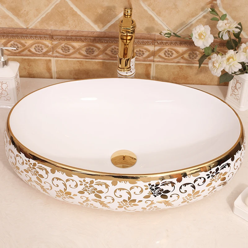 Gilded Elegance Oval Shaped Basin with Intricate Gold Designs for a Luxurious Bathroom ceramic art wash basin counter top sinks