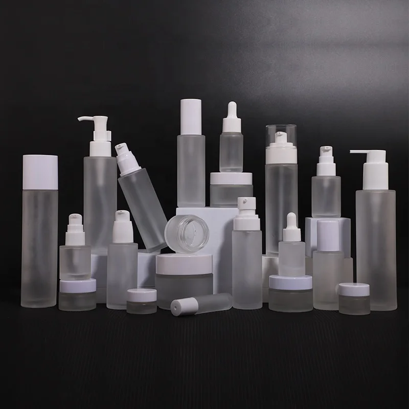 Custom clear frosted glass bottles for oil heavy weight cosmetic packaging pump bottle for facial  toner lotion hair oil bottles