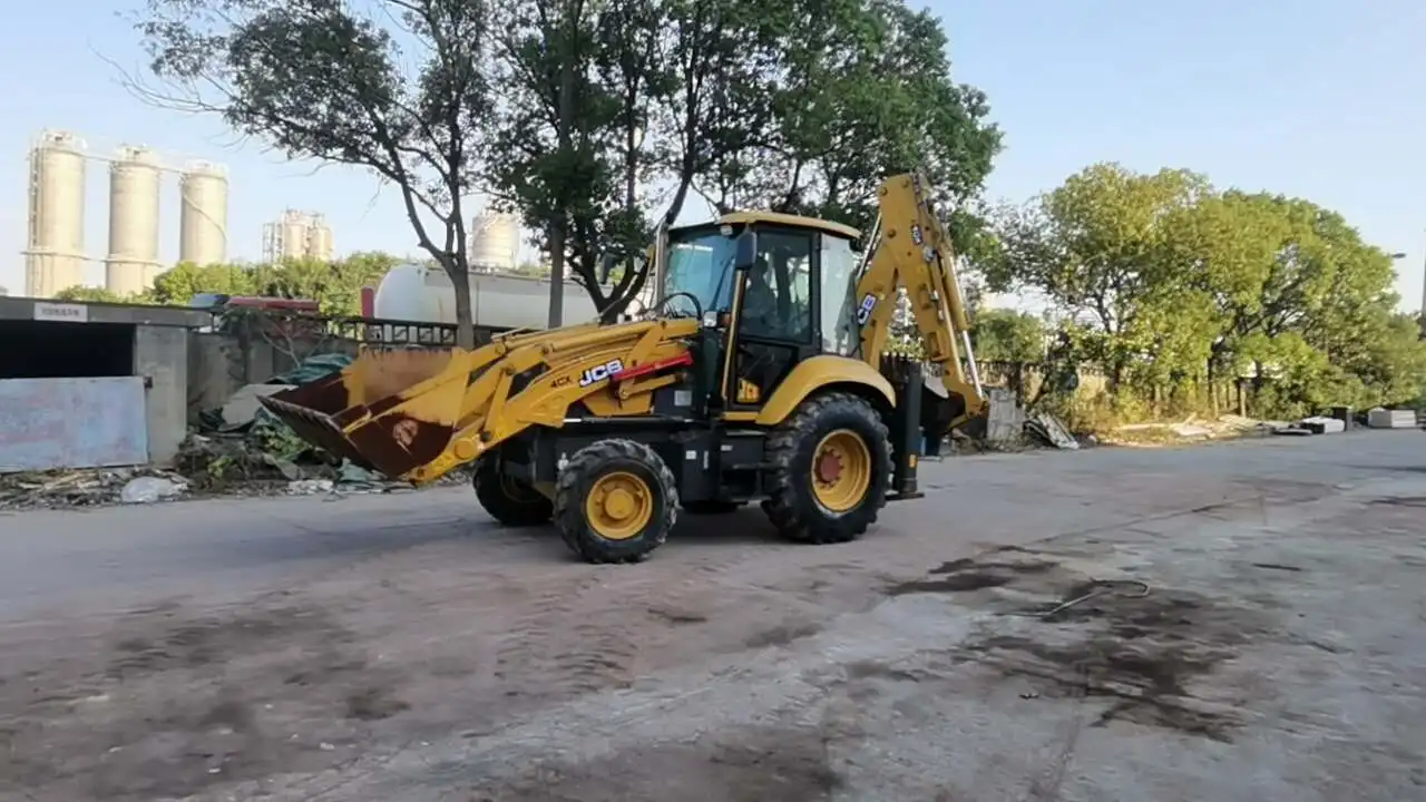 Б/у экскаватор-погрузчик J-CB 4CX на