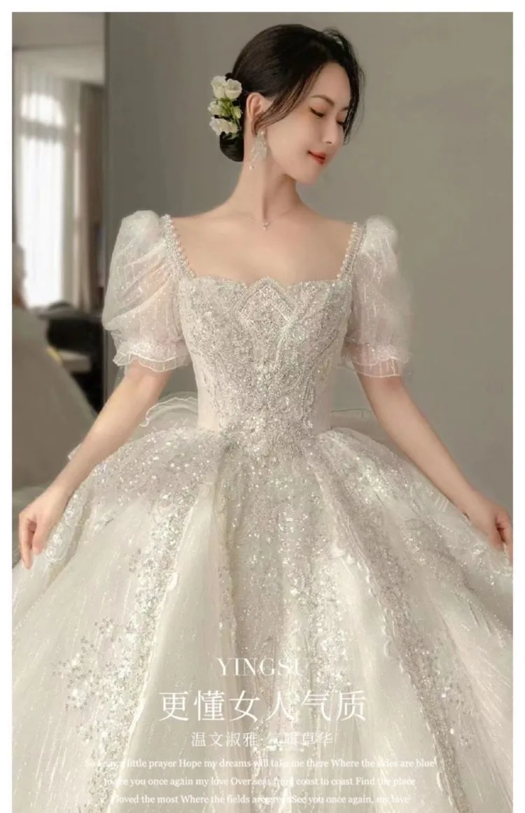 French light wedding dress 2023 new bride main yarn bubble sleeve trailing heavy industry wedding dress wholesale