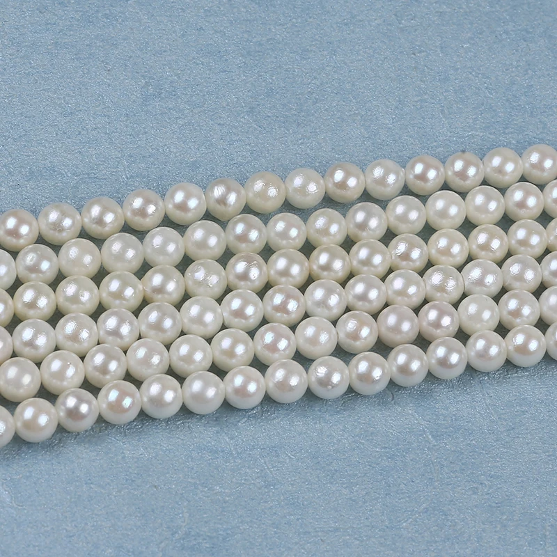 6,5-7 мм, культивированные белые круглые бусины россыпью, нить морского жемчуга