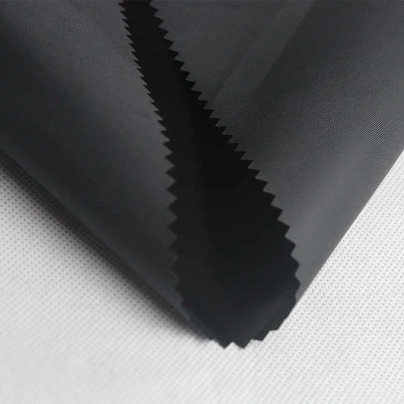 outdoor garment use Mirror calender 100% polyester waterproof  cire taffeta jacket down garment fabric