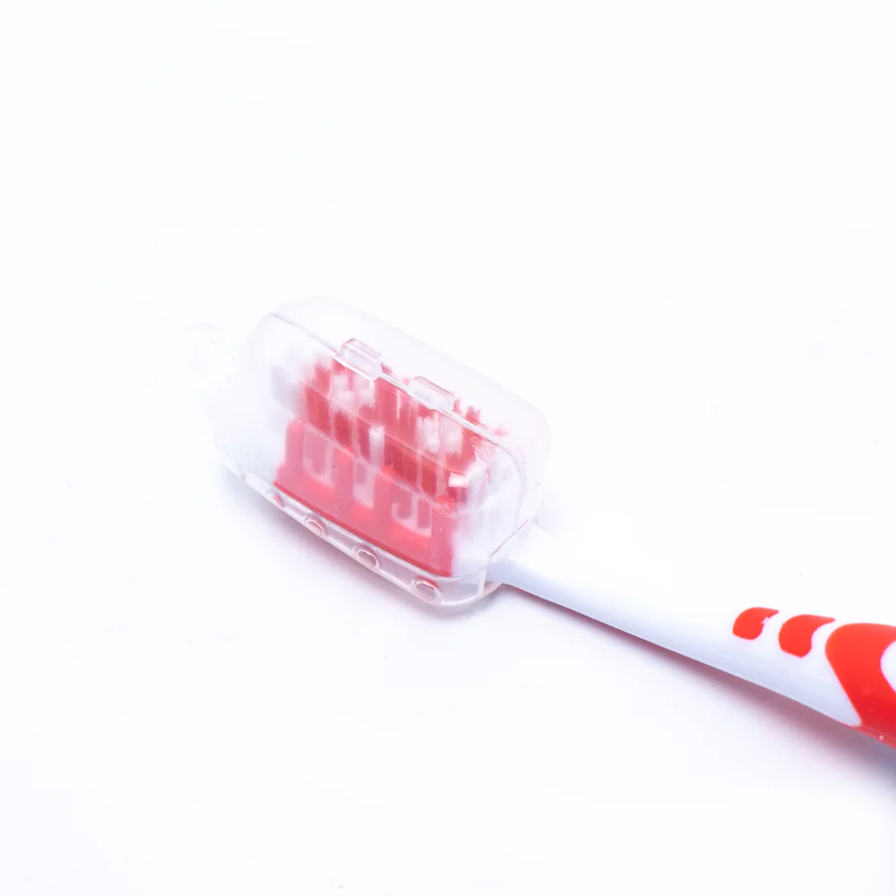 Made in China adult toothbrush with pp colorful handle gum massage feature silicone adult toothbrush