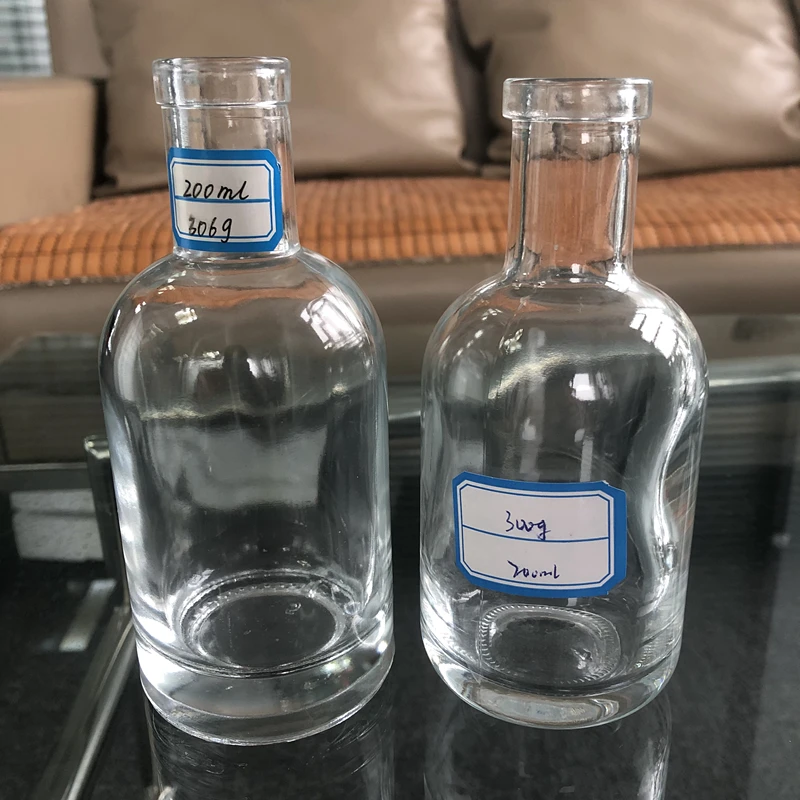 Hot selling free samples transparent frosted 100 ml glass vodka bottle reusable customized glass bottle for vodka