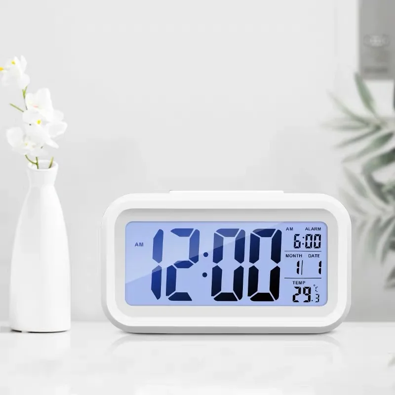 Classic LCD digital clock with calendar light sensor and alarm snooze