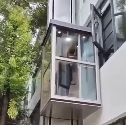 Small household elevator indoor and outdoor simple and silent household two-story three-story villa elevator factory small eleva