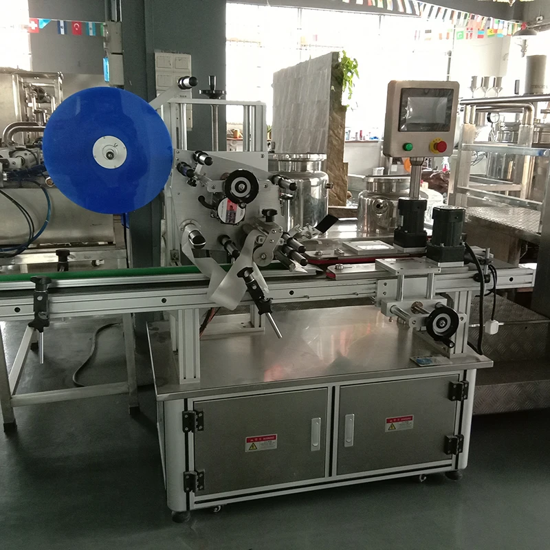 labeling machine label applicator on top surface