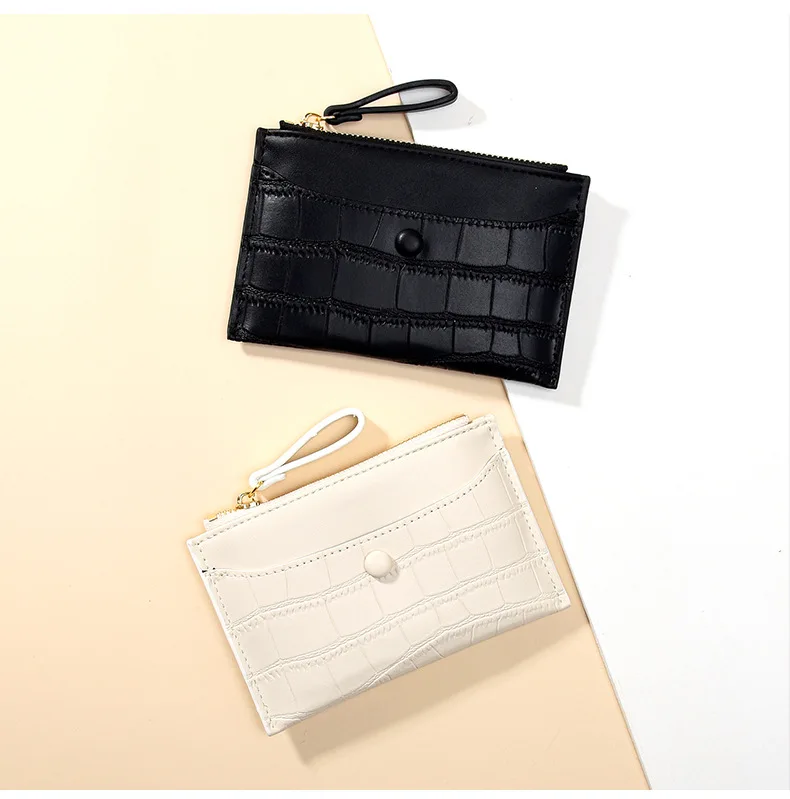 Женский кожаный кошелек с ручкой