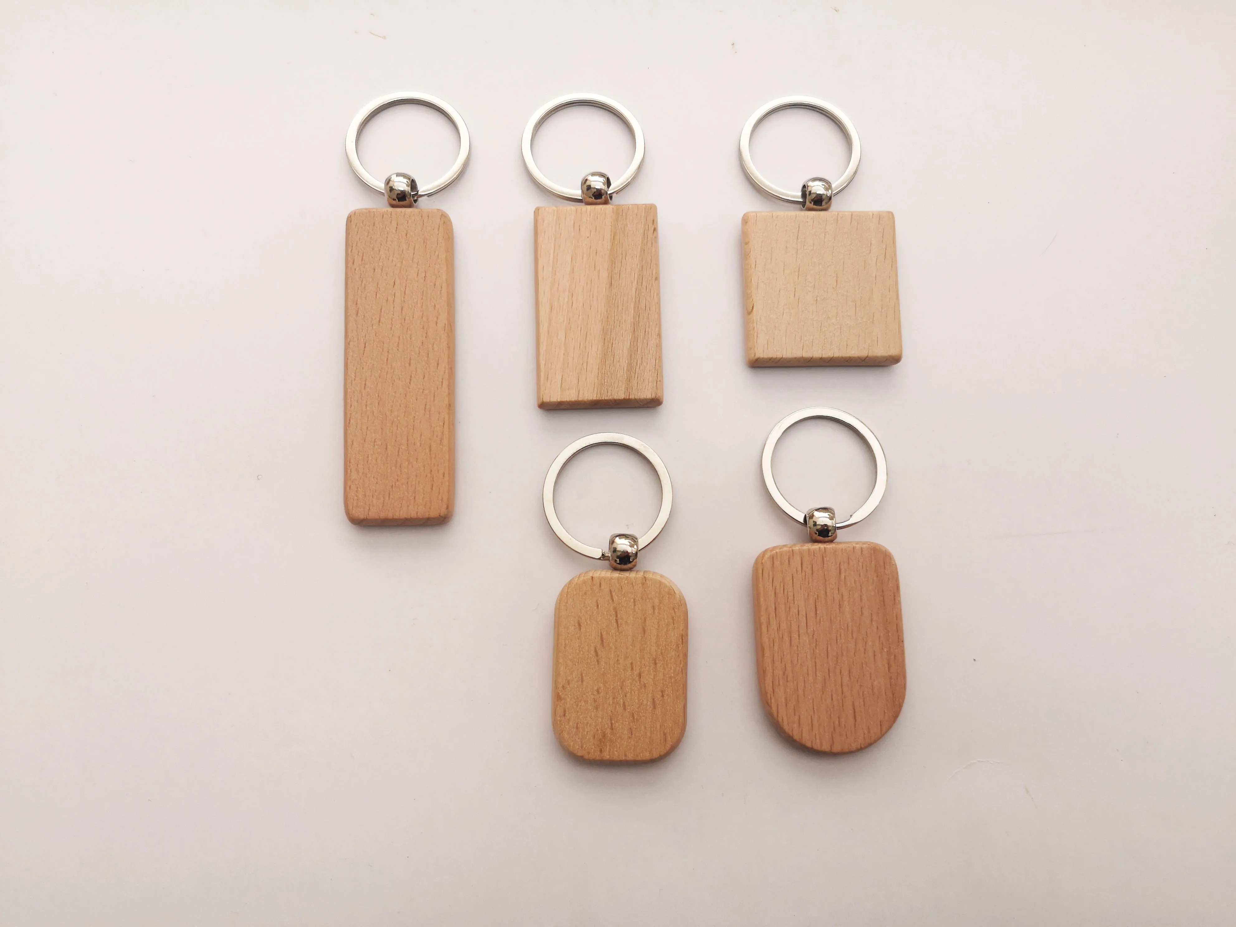 No MOQ DIY blank beech wood key ring, customized laser/printing  LOGO geometric wooden carving keychain