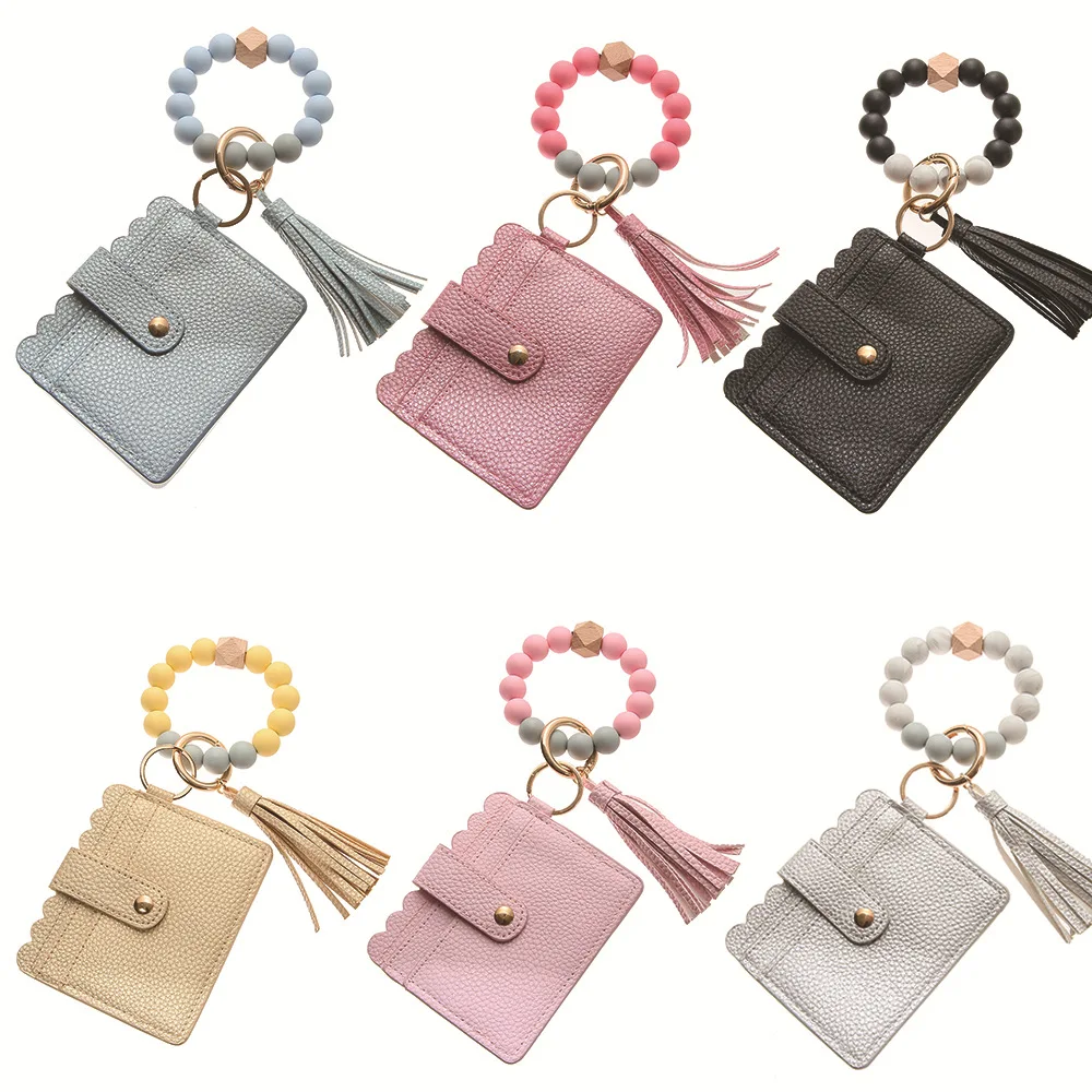 2021 Hot Sale Silicone Pu Lady Purse With Tassel Beaded Bracelet Keychain With Tassel