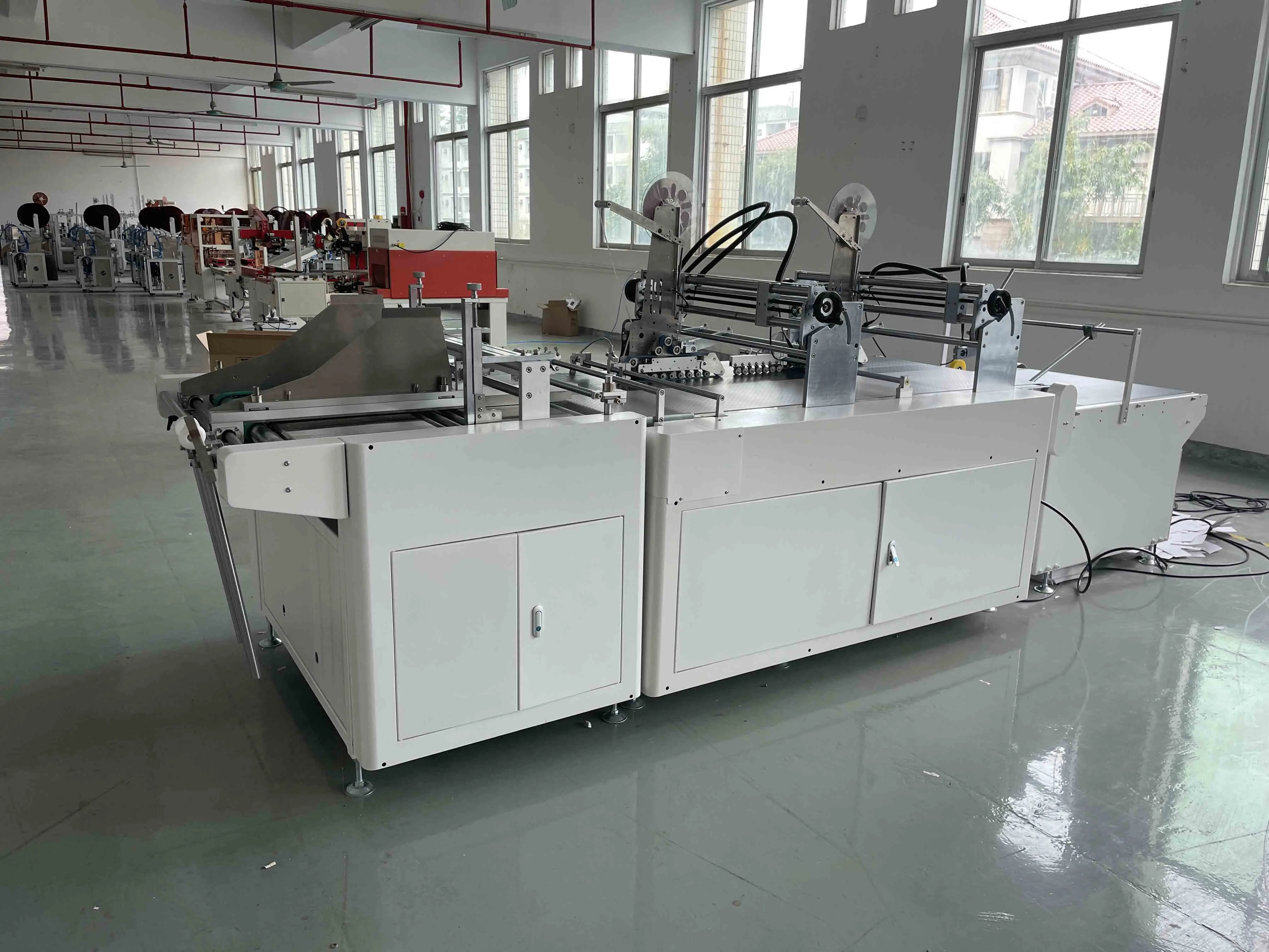 Automatic assembly line nucleic acid reagent card, carton envelope courier bag double-sided adhesive Labeling machine
