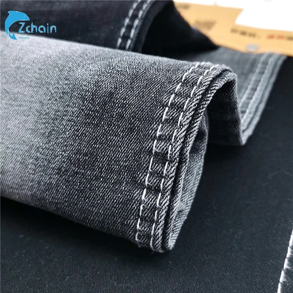 Cheapest twill stretch denim stock lot fabric pakistan denim jeans factory