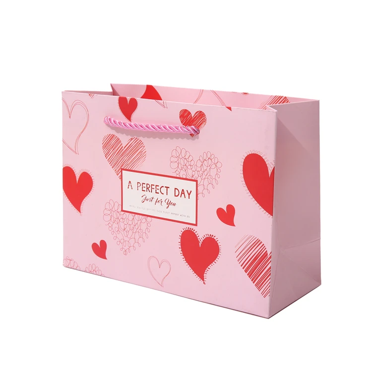 Gonhua Wholesale Luxury Gold Foil Pink Kraft Packing Paper Bag With Ribbons Custom Logo Gift Printed Shopping Bag