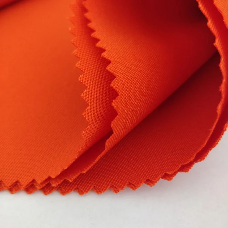 Hot sale woven orange 100% polyester gabardine twill fire retardant polyester fabric