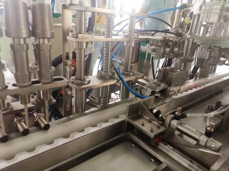 Auto maple syrup packaging equipment bottle honey filling and capping machine