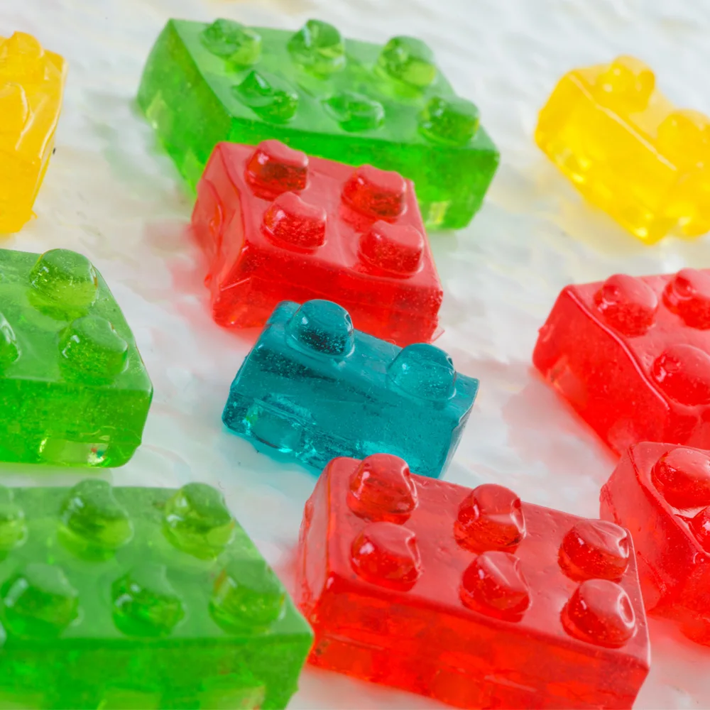 Amos OEM Candy Building Block Bonbons Custom Personal Label Halal Jam Filled 4D Jelly Gummy Soft Candy Sweets