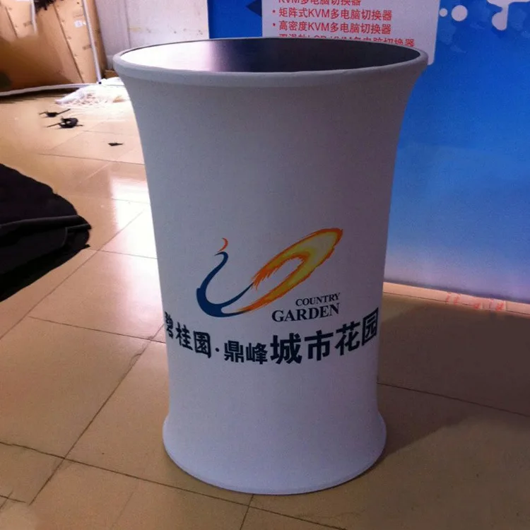 Low MOQ Exhibition Booth Portable Tension Fabric Advertising Display Auto Shrink Pop Up Display Counter Table