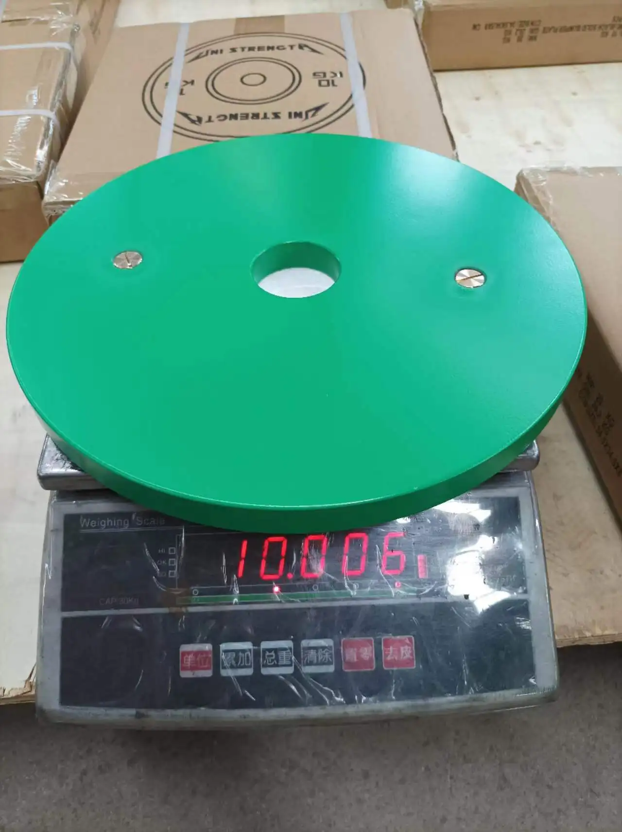 Calibrated steel power lifting barbell weight plates