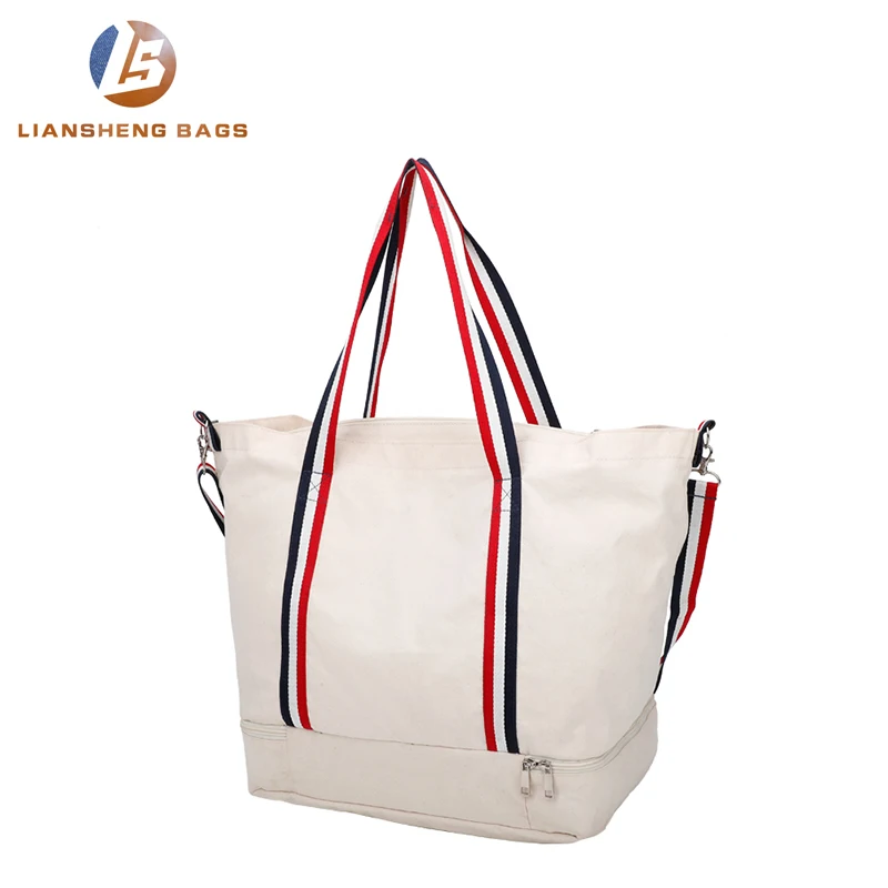 
Large canvas bag with separate layer of shoes and umbrellas underneath 