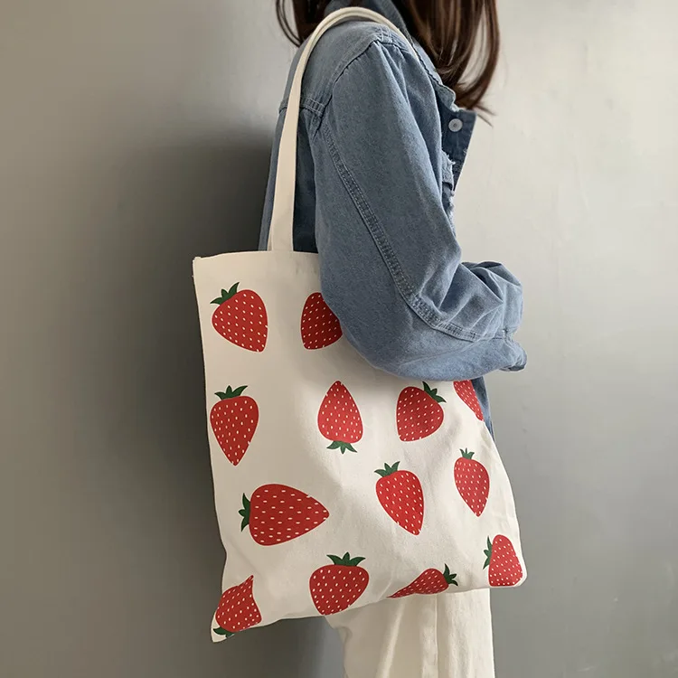 2024 new strawberry printed canvas bag, college student ins shoulder bag, large capacity canvas book bag
