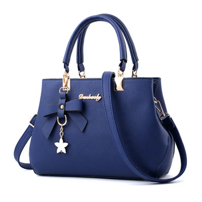wholesale fashion women PU leather blue shoulder bag with zipper pockets flower tassel