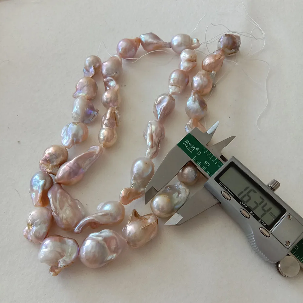 15-18 mm big baroque shape keshi pearl  loose freshwater pearl in strand . nature pink color