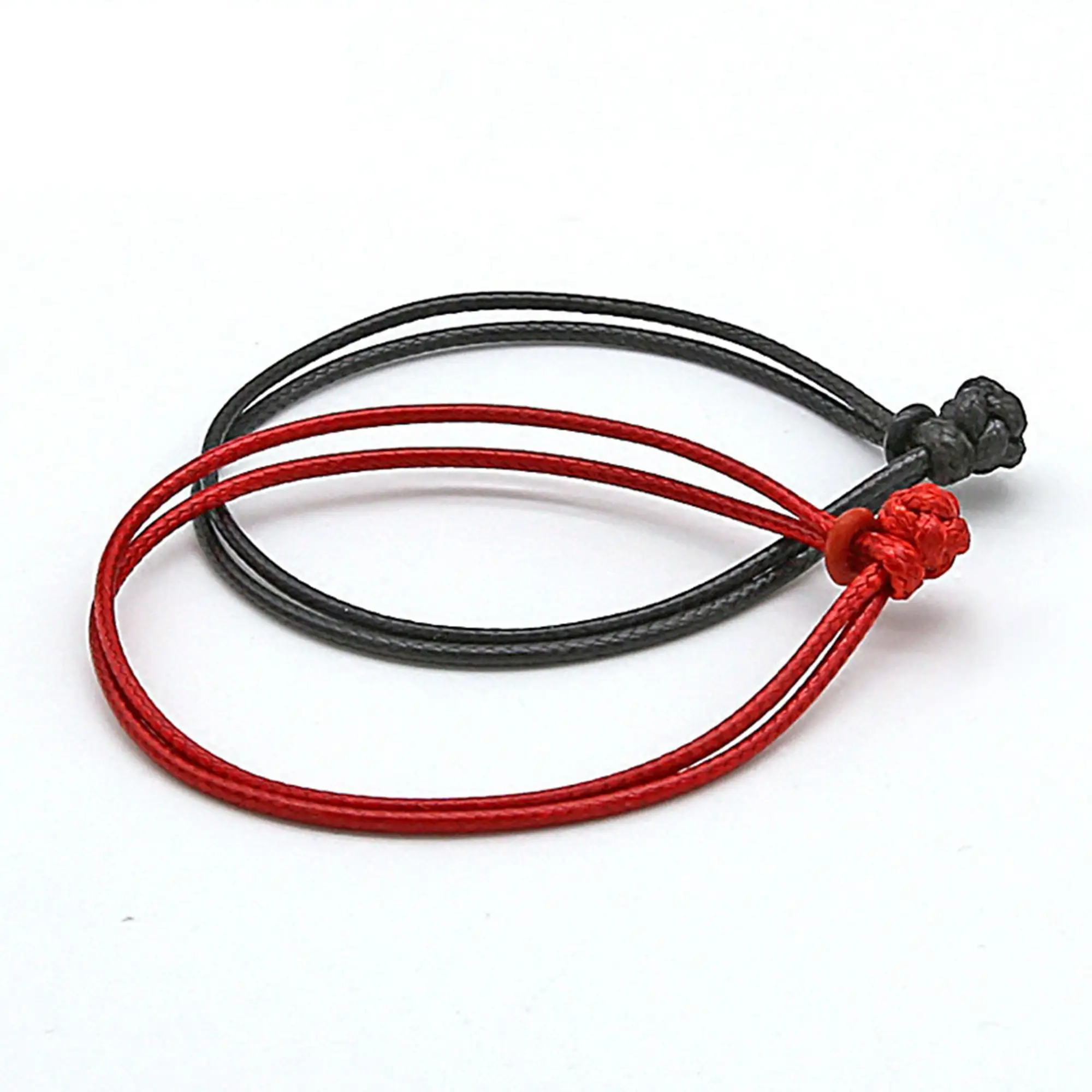 Bracelet multi strings  with braid and medallion, waxed, black polyester rope