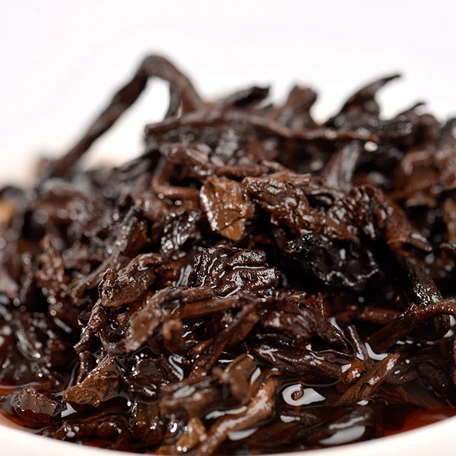 factory direct price Yunnan Yiwu mountain ripe Pu er loose tea leaves ,puer tea cake fermented 357g