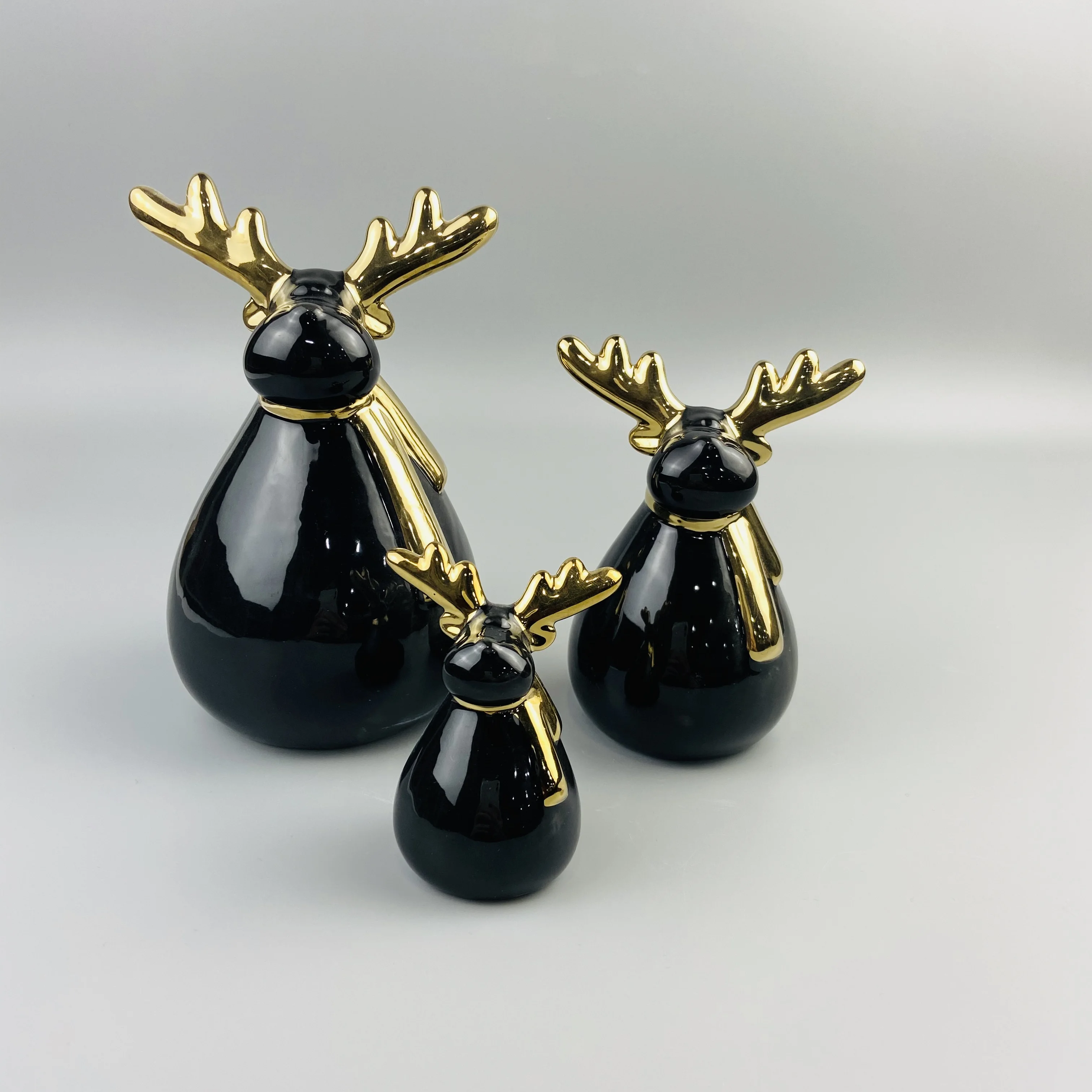 
Newest ball shape body black ceramic deer ornament with gold antler 