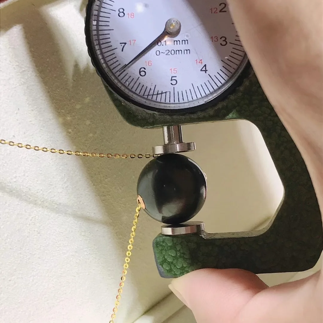 Natural seawater Tahiti Pearl 16-17mm slight flaw with 18K gold chain