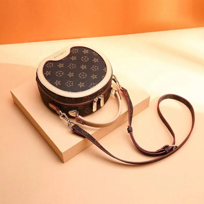 
2019 new fashion ladies trend printing retro portable slung small round bag 