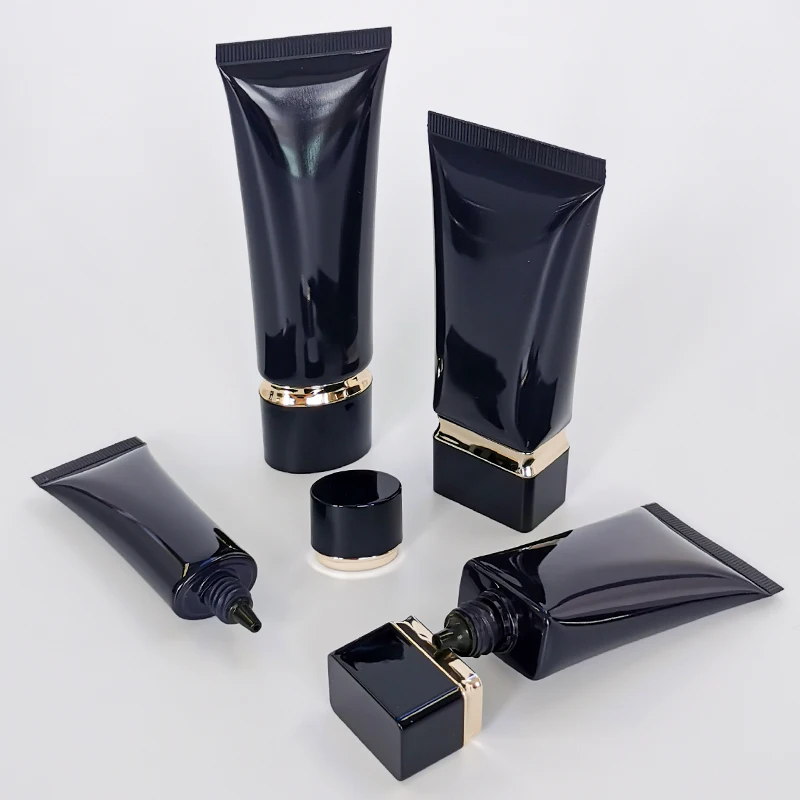 Competitive price round packaging cosmetic tube black plastic tubes withe lids