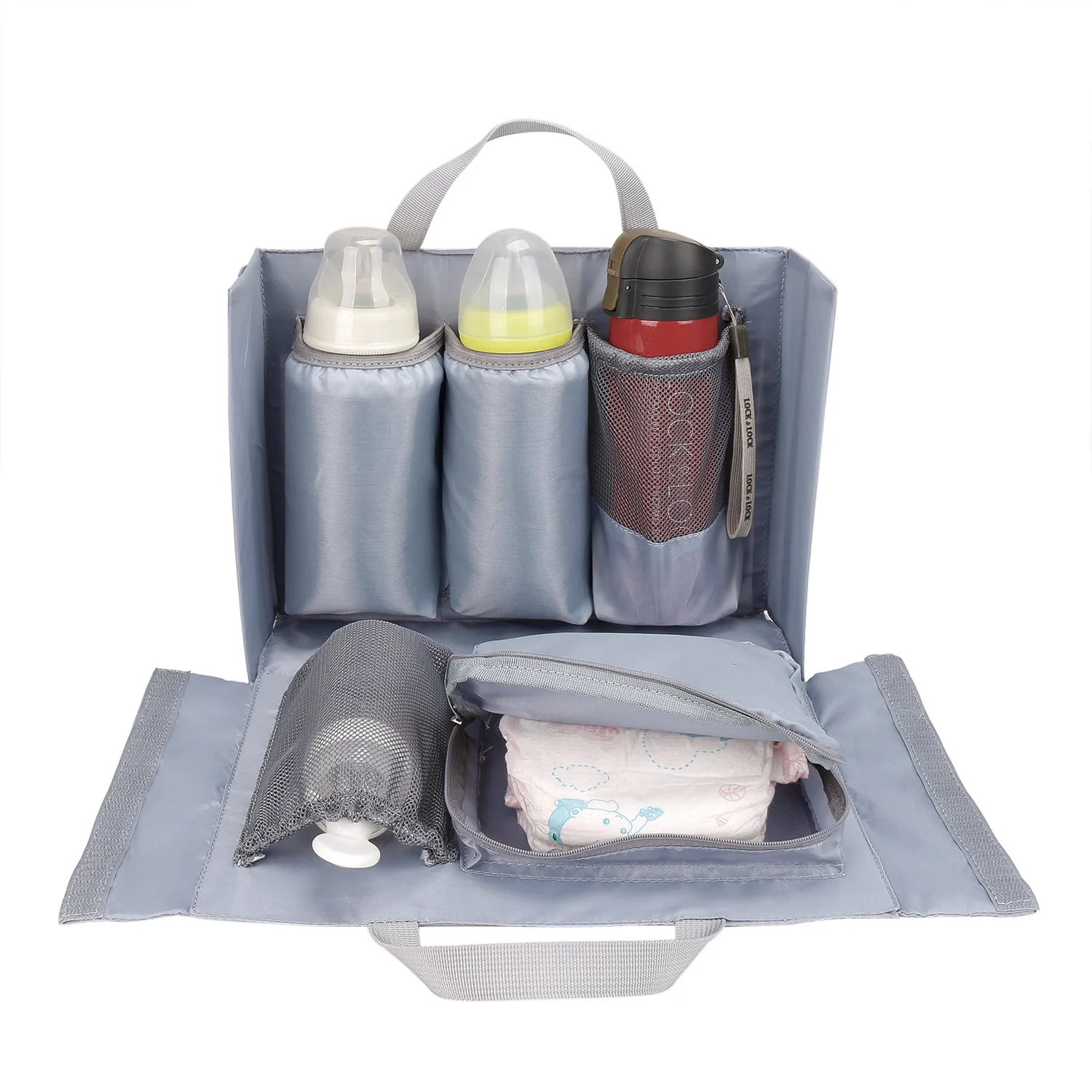 Detachable diaper bag liner with 6 total pockets, including an insulated pocket, keychain and washable changing pad.