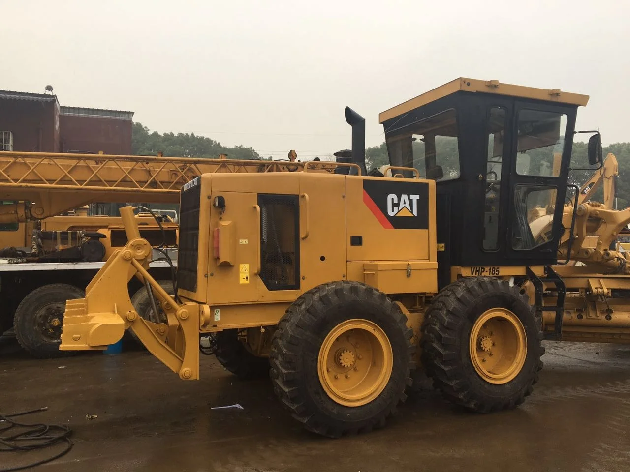 Автогрейдер Caterpillar140H сделано в