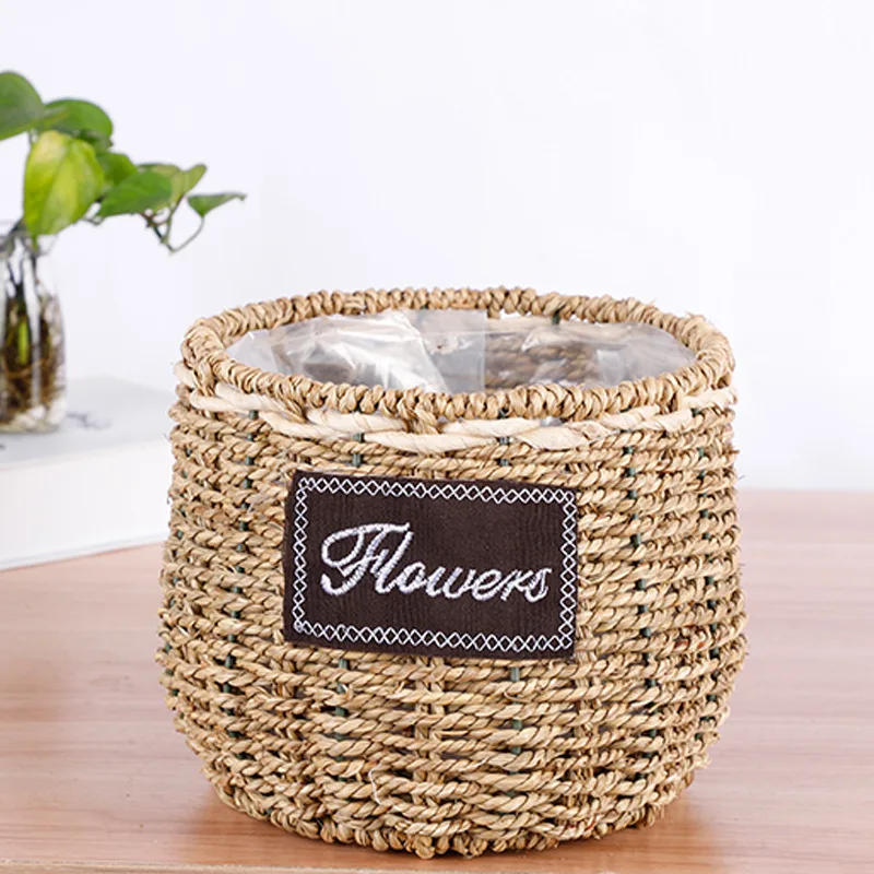 handmade straw braid woven flower basket with plastic liner/wholesale straw grass rope flower gift basket with plastic liner