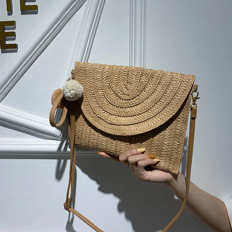 
Raffia clutch hand evening bag pu leather long strip sling woven beach rattan straw bag with pom pom 