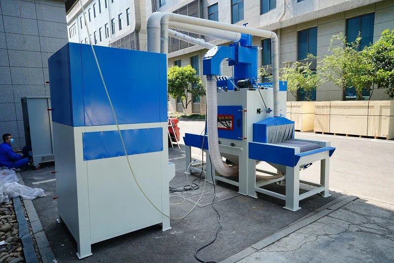 Automatic roller conveyor sand blasting machine