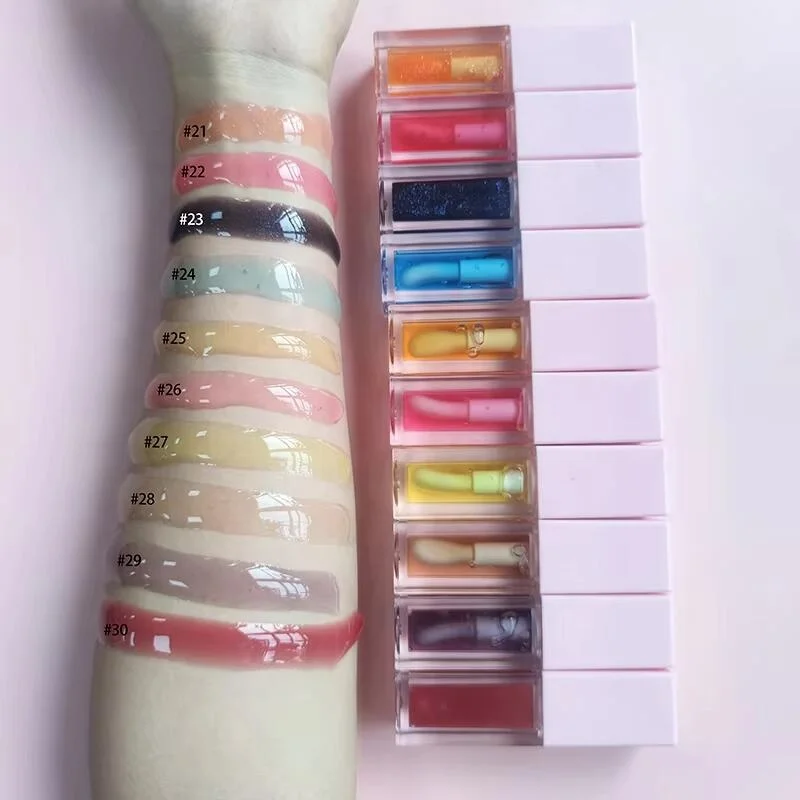 Wholesale Lip Gloss Oil Treatment Lipgloss Private Label Glossy Lip Balm Hyaluronic Acid vegan Lip Oil