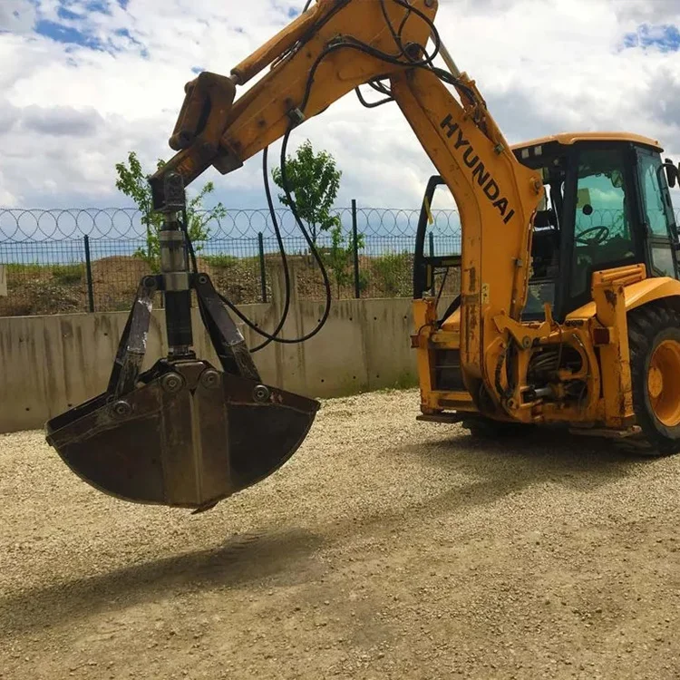 Clamshell grab for hydraulic excavator designed for use on truck mounted cranes hydraulic excavators and material handlers