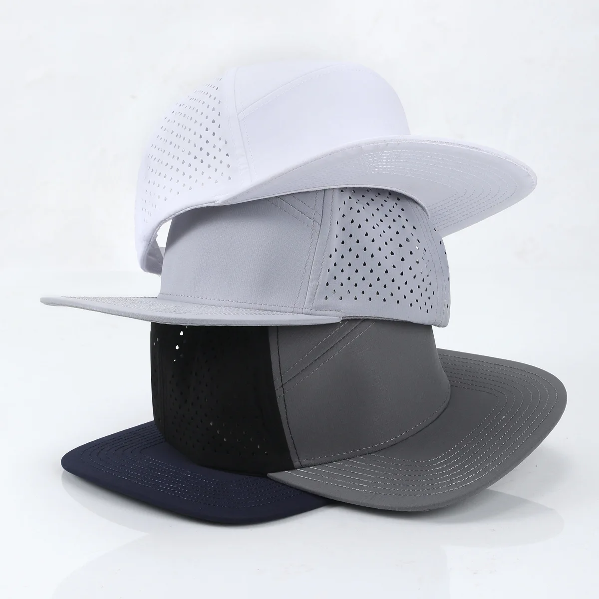 New Arrival Quick Dry Flat Brim Snapback Caps Custom Embroidery Logo 7 Panel Perforated Laser Cut Hole Mesh Trucker Hats