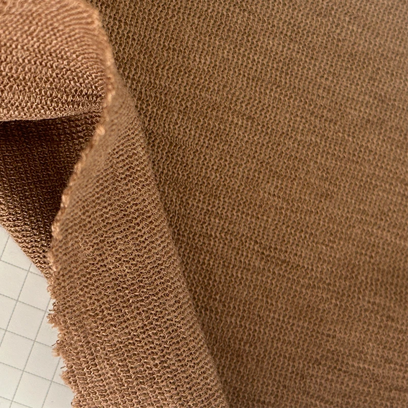 100% Merino wool 100% wool is used to make fabrics for coats, skirts, jackets and trench coats