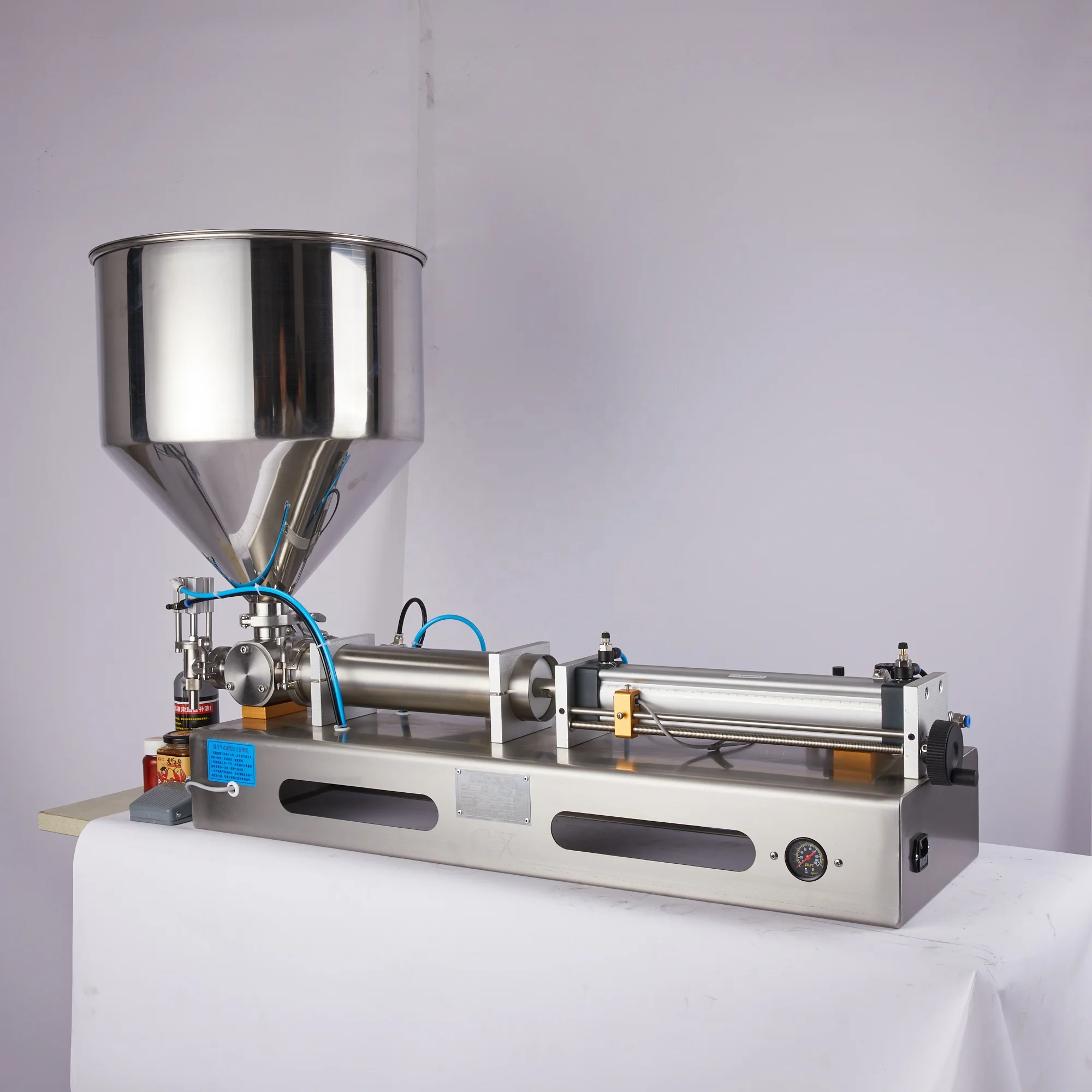 Semi automatic cream filler machine plastic cup/aluminum can/glass bottle food paste yoghurt filling machine