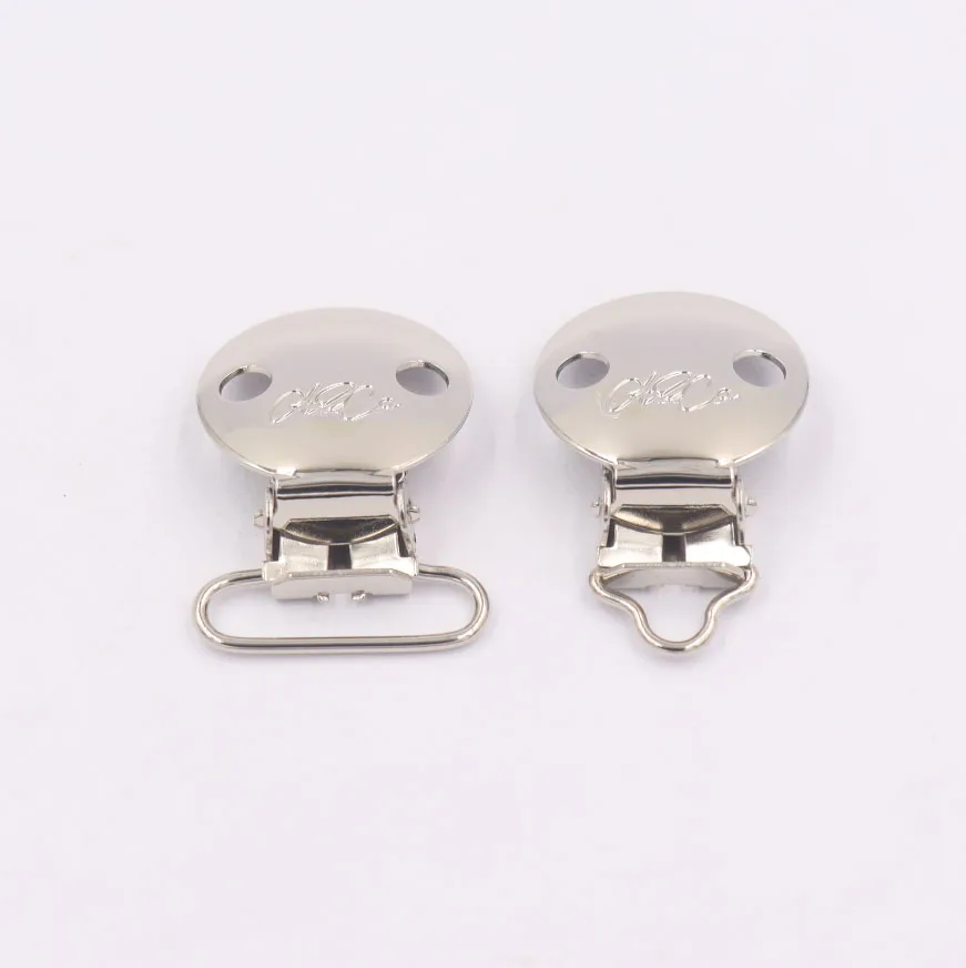 Factory custom design stainless steel baby pacifier clips for ribbon